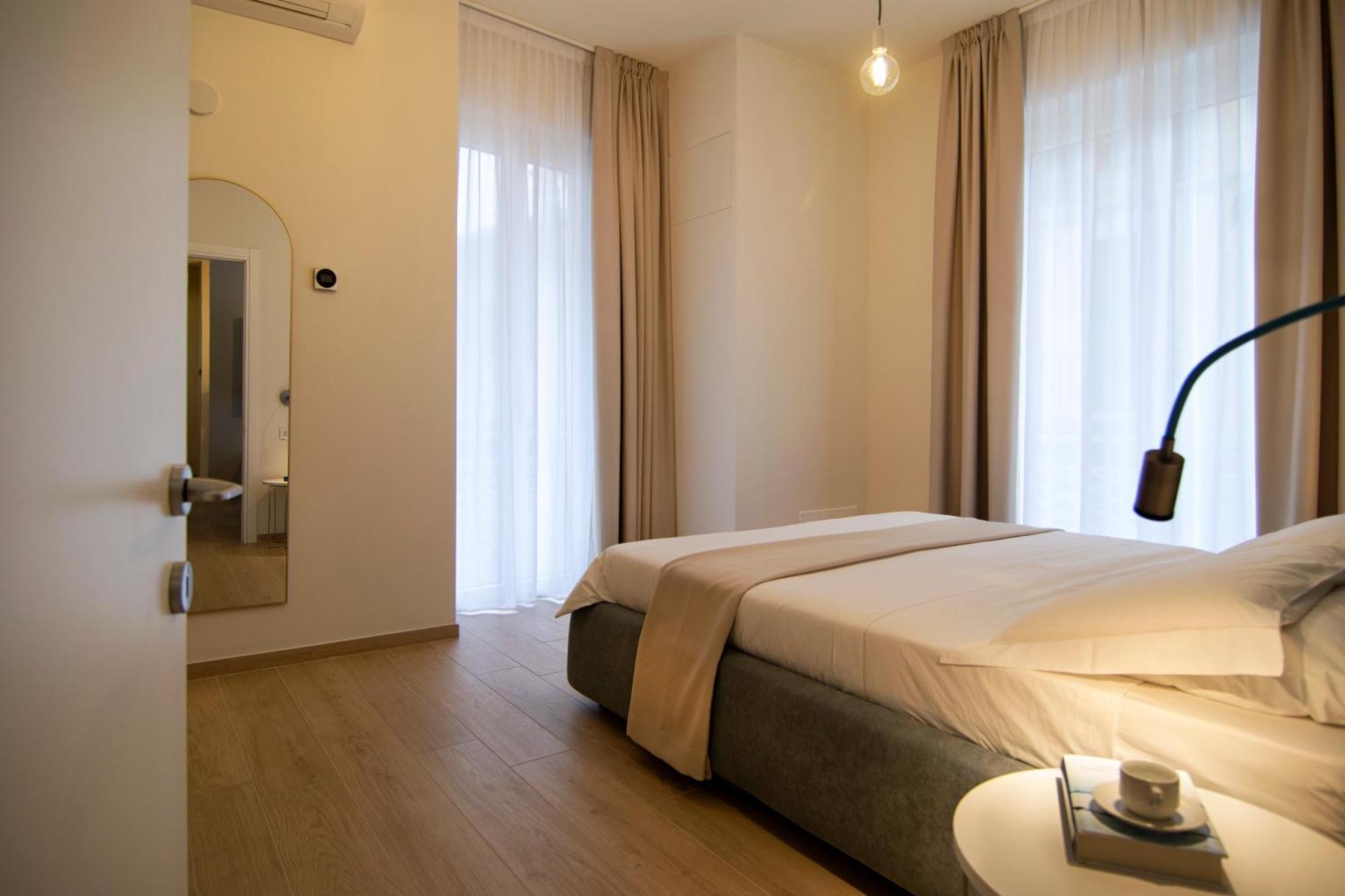 Gigi Suites&Apartments Stresa Bagian luar foto